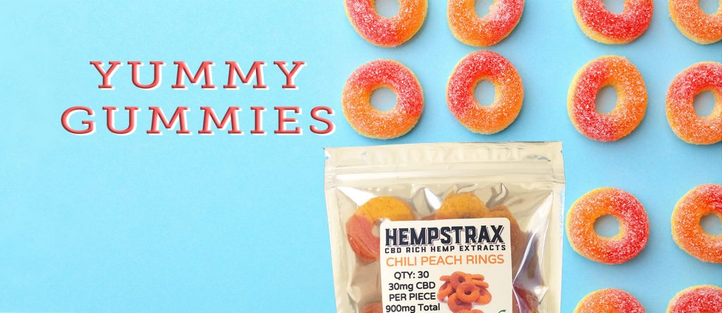 Chili Peach Ring CBD Gummies on blue background with text of Yummy Gummies